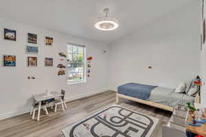 Bedroom with light wood-type flooring