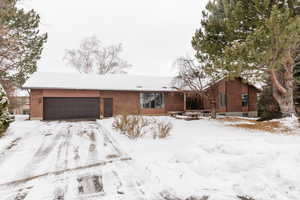 Ranch-style house with a garage