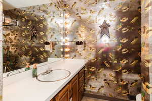 Bathroom with vanity and toilet