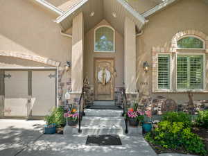 Property entrance with a garage