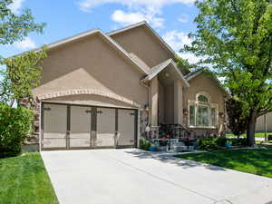 View of front of house with a front lawn