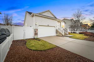 View of front of property featuring a yard