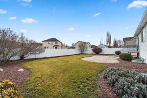 View of yard with a patio area