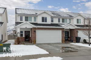 View of front of house with a 2-car garage