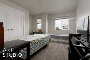 Bedroom with carpet flooring