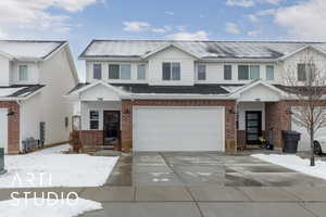 View of front of property featuring a 2-car garage