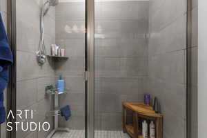 Bathroom featuring an enclosed shower