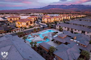 Aerial view at dusk featuring a mountain view