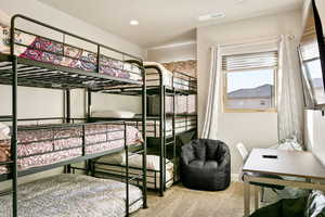 Bedroom featuring carpet floors