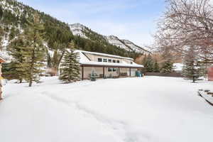 View of front of property with a mountain view