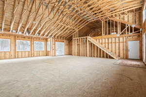 Misc room featuring vaulted ceiling