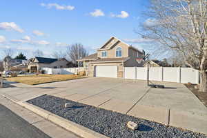 View of front of property with a garage