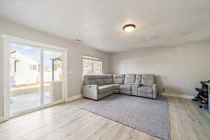 Living room featuring light hardwood / wood-style floors