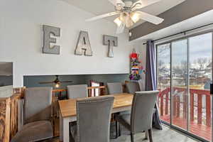 Dining area with light hardwood / wood-style flooring