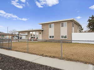 View of front of house with a front yard