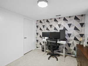 View of carpeted home office