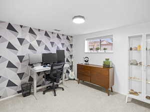 View of carpeted home office