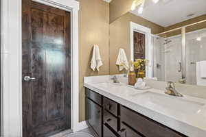 Bathroom with vanity and walk in shower