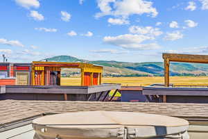 Exterior space with a mountain view and a rural view