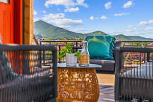 Wooden terrace with a mountain view