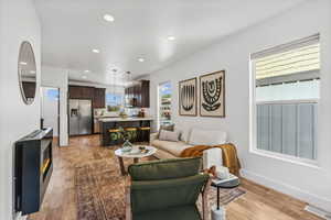 Living room featuring light hardwood / wood-style flooring