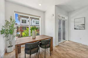 Dining space featuring light wood-type flooring