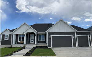 View of front of home featuring a garage