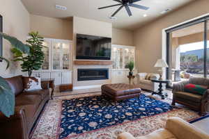 Living room featuring ceiling fan