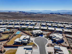 Birds eye view of property with a mountain view