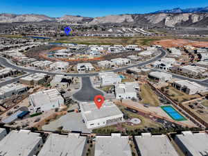 Birds eye view of property with a mountain view