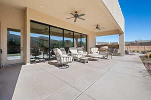 View of patio with ceiling fan