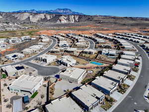 Birds eye view of property with a mountain view