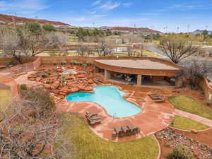 View of swimming pool with a patio area