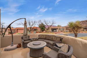 View of patio with an outdoor living space