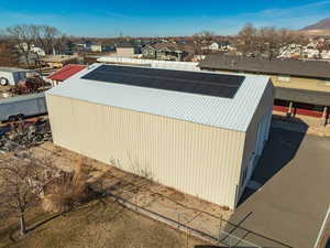 View of side of home with solar panels