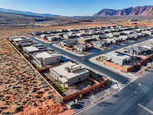 Birds eye view of property with a mountain view