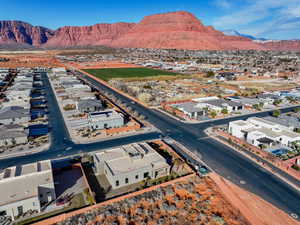 Birds eye view of property with a mountain view