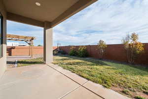 View of yard with a patio area