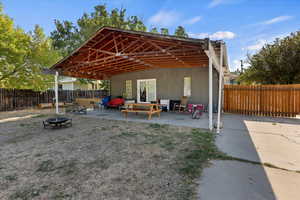 View of patio / terrace with an outdoor fire pit