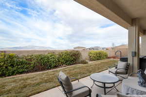 View of patio featuring a mountain view