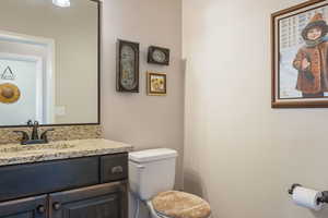 Bathroom with vanity and toilet