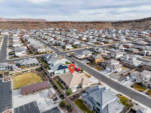 Birds eye view of property with a mountain view