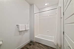 Bathroom with shower / bath combo with shower curtain