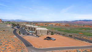 Birds eye view of property with a mountain view