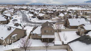 Snowy aerial view with a mountain view