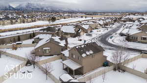 Snowy aerial view with a mountain view