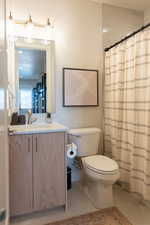 Bathroom with vanity and toilet