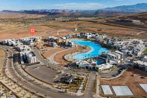 Birds eye view of property with a mountain view