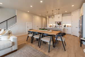 Dining room featuring light hardwood / wood-style floors and sink