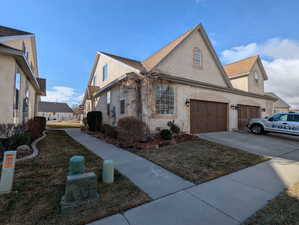 View of home's exterior featuring a yard